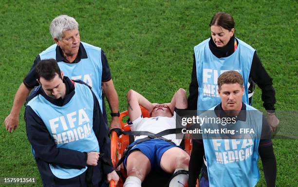 Keira Walsh of England is stretched off after an injury during the FIFA Women's World Cup Australia & New Zealand 2023 Group D match between England...