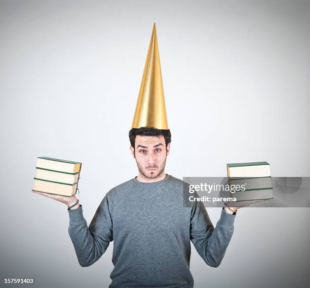 punished - dunce cap stock pictures, royalty-free photos & images