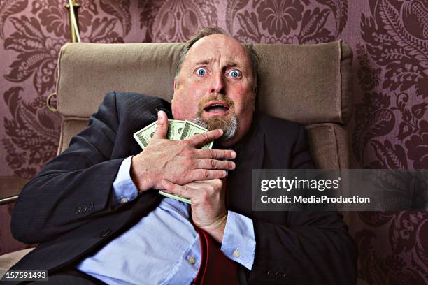 afraid to loose money - money fear stock pictures, royalty-free photos & images
