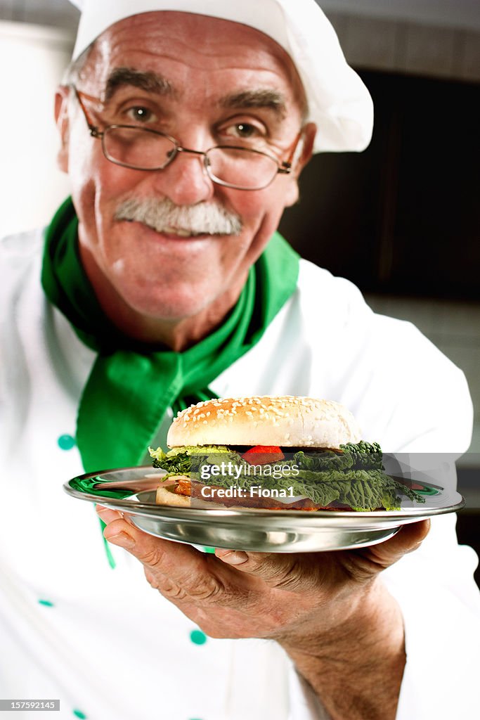 Cook offering hamburger