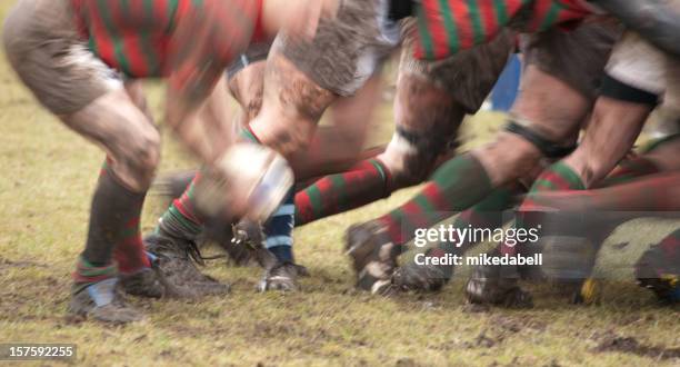 lower body view of rugby scrum in action - rugby scrum stock pictures, royalty-free photos & images