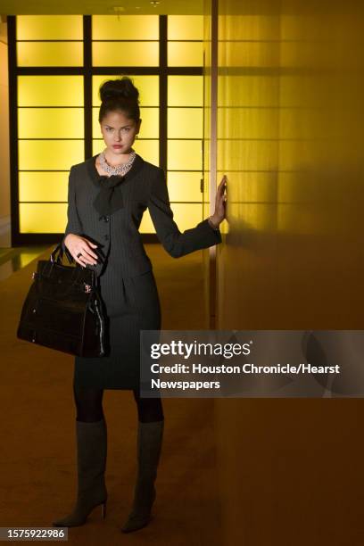 Jennifer Coleman of Page.713 wears a MaxMara suit, $1 Elizabeth Anthony-Esther Wolf; Tania Spinelli boots, $1 and YSL bag, $945, Neiman Marcus....