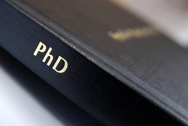 phd thesis hardbound cover macro - use dissertation stock pictures, royalty-free photos & images