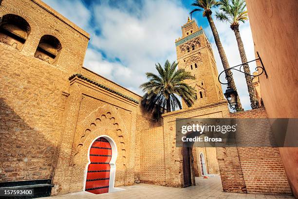 a stunning mosque in koutoubia - koutoubia mosque stock pictures, royalty-free photos & images