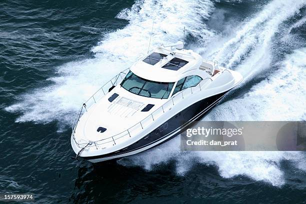 speeding powerboat - speed boat stock pictures, royalty-free photos & images
