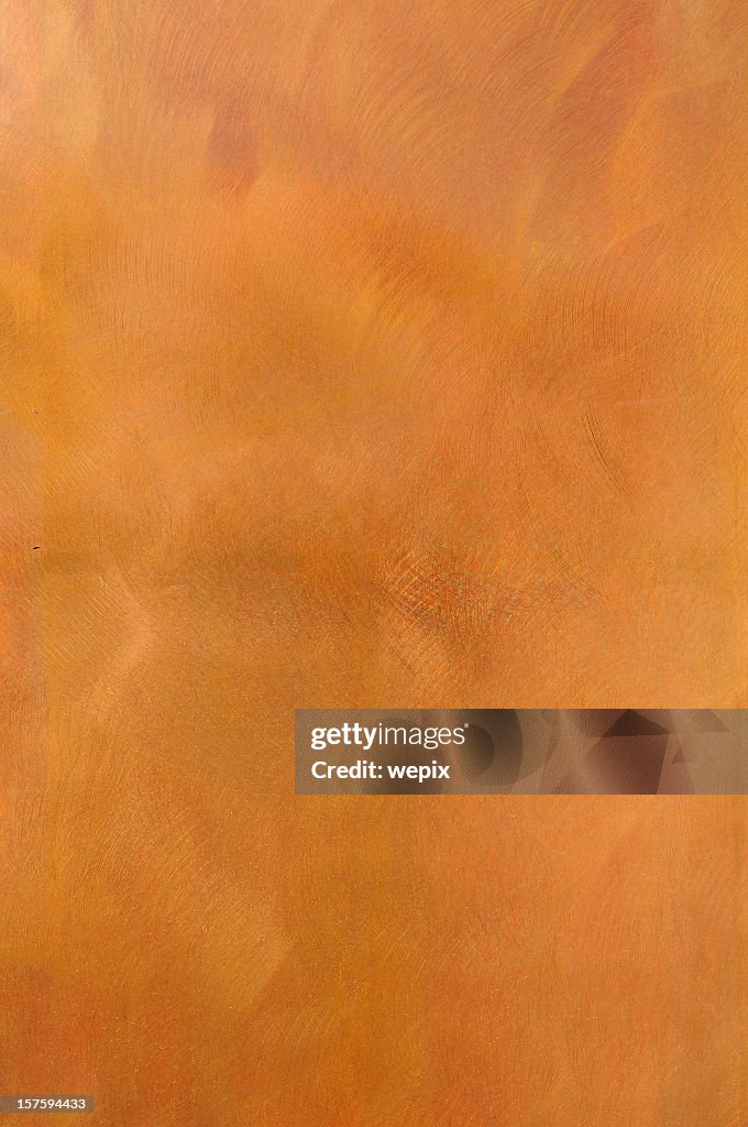 Reddish Brown golden textured metal surface background