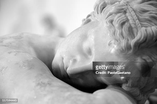 the sleeping hermaphrodite - marble sculpture stock pictures, royalty-free photos & images