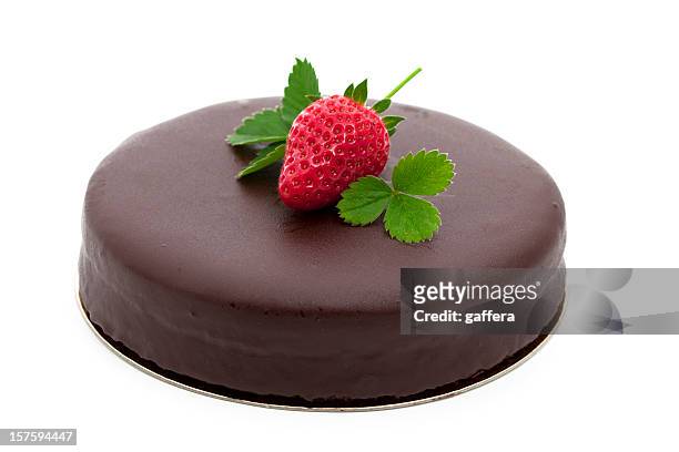 chocolate cake topped with a strawberry - sachertorte stock pictures, royalty-free photos & images