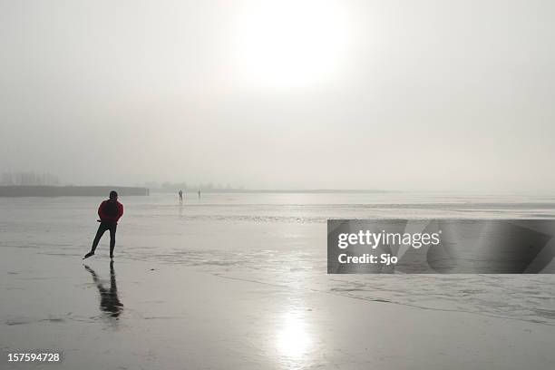 ice skating on a lake - ice skate bildbanksfoton och bilder