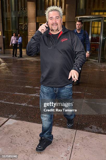 Personality Guy Fieri leaves the Sirius XM Studios on December 4, 2012 in New York City.