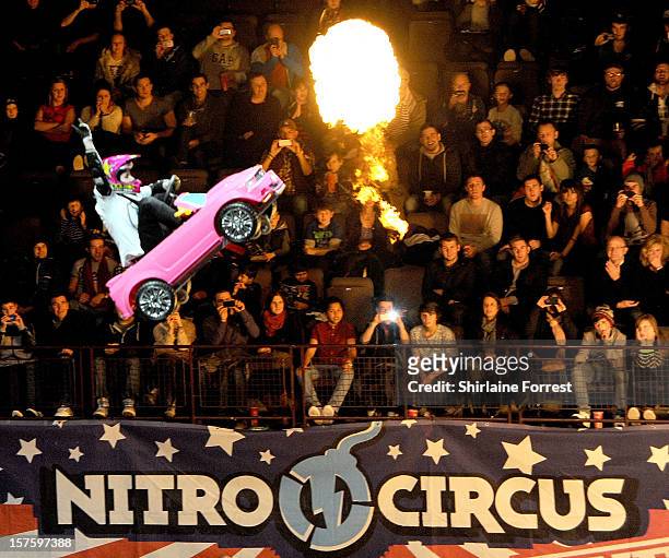 Jolene Van Vugt rides a Barbie car at Nitro Circus Live at Manchester Arena on December 4, 2012 in Manchester, England.