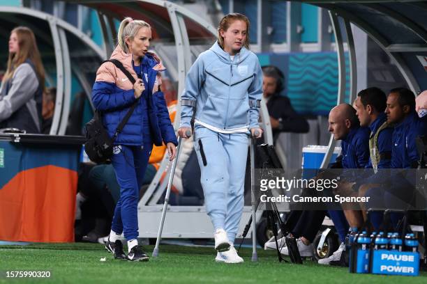 Keira Walsh of England returns to the bench with crutches during the FIFA Women's World Cup Australia & New Zealand 2023 Group D match between...