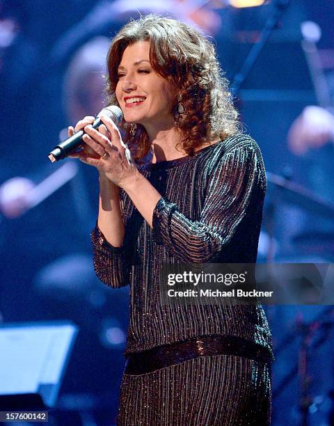 Singer Amy Grant performs onstage during a celebration of Carole King and her music to benefit Paul Newman's The Painted Turtle Camp at the Dolby...