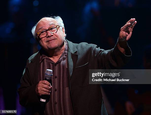 Actor Danny DeVito speaks onstage during a celebration of Carole King and her music to benefit Paul Newman's The Painted Turtle Camp at the Dolby...