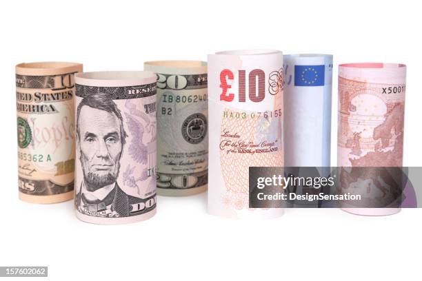 banconote in una riga-rotolo (xxxl - cambio valuta foto e immagini stock