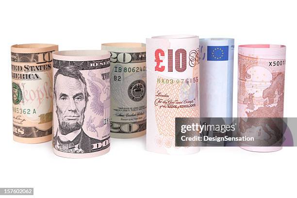 banknotes in a line - rolled up (xxxl) - bureau de change stock pictures, royalty-free photos & images