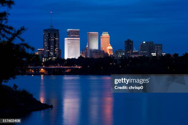 tulsa skyline at dusk - tulsa stock pictures, royalty-free photos & images