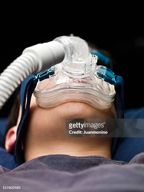 child wearing a respiratory mask - ventilator stock pictures, royalty-free photos & images