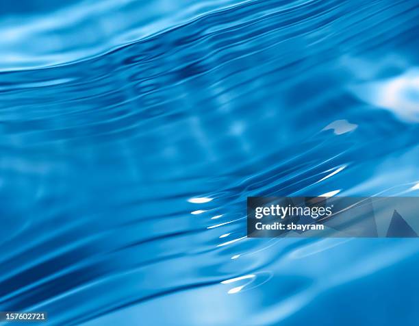 water background - blue water ripple overhead stock pictures, royalty-free photos & images