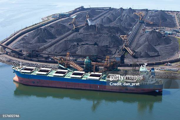 cargo ship being loaded with coal - coal stock pictures, royalty-free photos & images