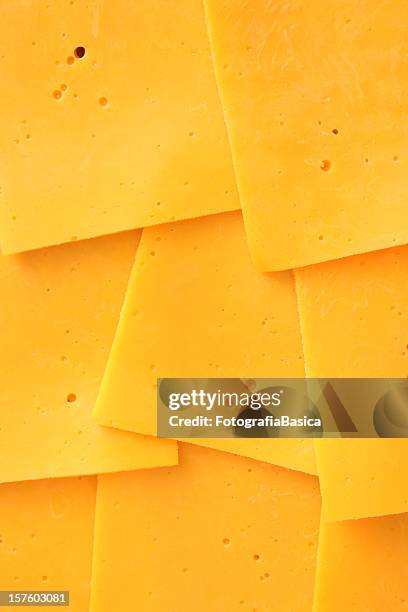 cheddar slices - cheese stockfoto's en -beelden