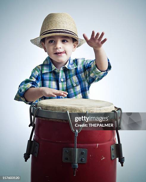 cuban boy playing latin percussion - conga stock pictures, royalty-free photos & images