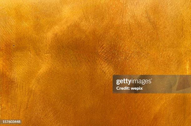 abstract golden brass plate mottled texture for backgrounds - bronze stock pictures, royalty-free photos & images