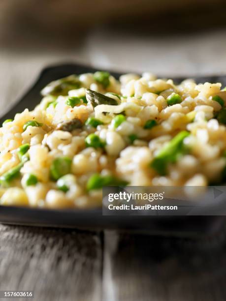 risotto primavera with asparagus - primavera stock pictures, royalty-free photos & images