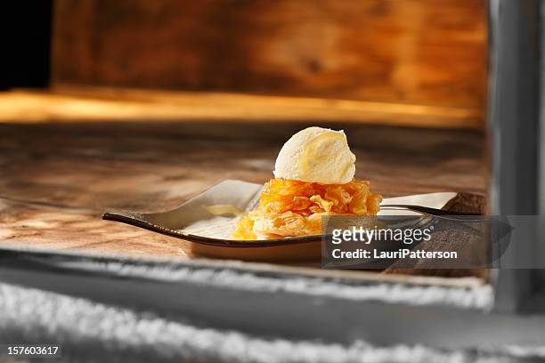 apple tart with vanilla ice cream - rustic cabin stock pictures, royalty-free photos & images