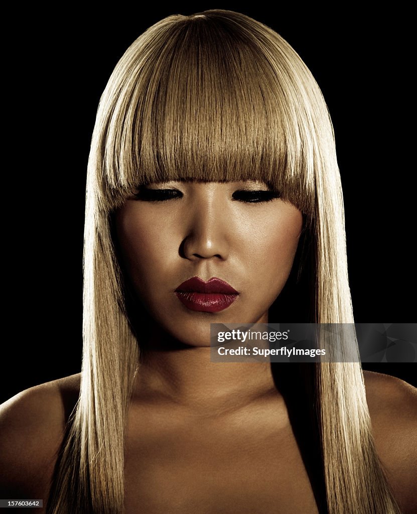 Sepia-toned Portrait of Asian Woman with Long Blonde Hair