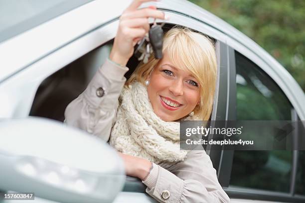 attractive blond teenager shows her car key - teen awards stock pictures, royalty-free photos & images