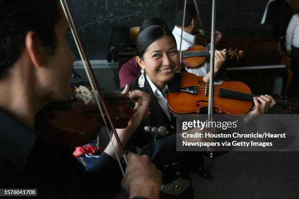 Alan Arce and Maria Sandoval of Mariachi MECA rehearse before the Heineken Green Ribbon presentation where MECA of Houston and National Association...