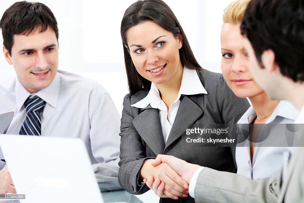 Business people shaking hands on meeting in the office.