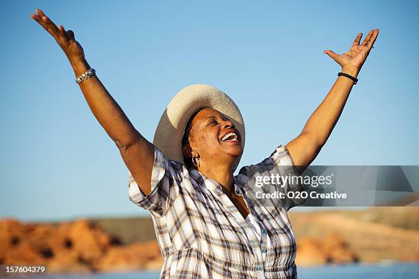 woman praising - singing praise stock pictures, royalty-free photos & images