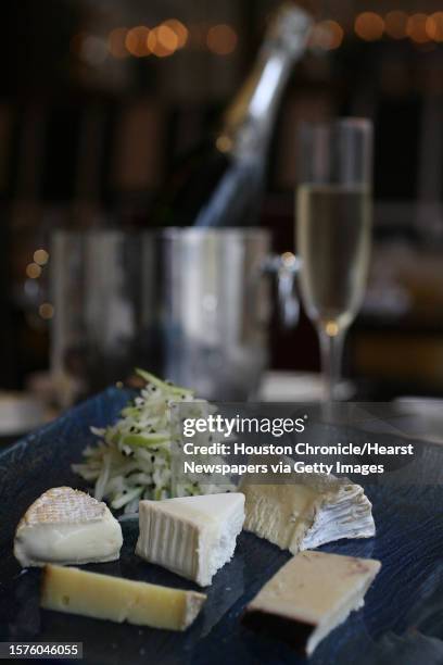 Tomme de Savoie and Ubriaco Prosecco Mont St. Francis, St. Maure, Chaource served with sparkling champagne at 17 Restaurant at Alden Houston Hotel on...