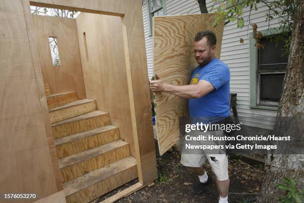 Gary Strube, iFest worker, builds the 20-foot Blarney Castle for the 2009 Houston International Festival spotlighting Ireland as they work through...