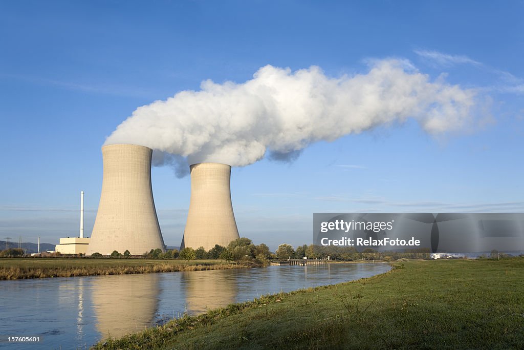 Nuclear power station with two steaming cooling towers riverside (XXXL)