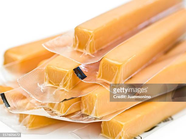cheddar cheese sticks - vacuum packed bildbanksfoton och bilder
