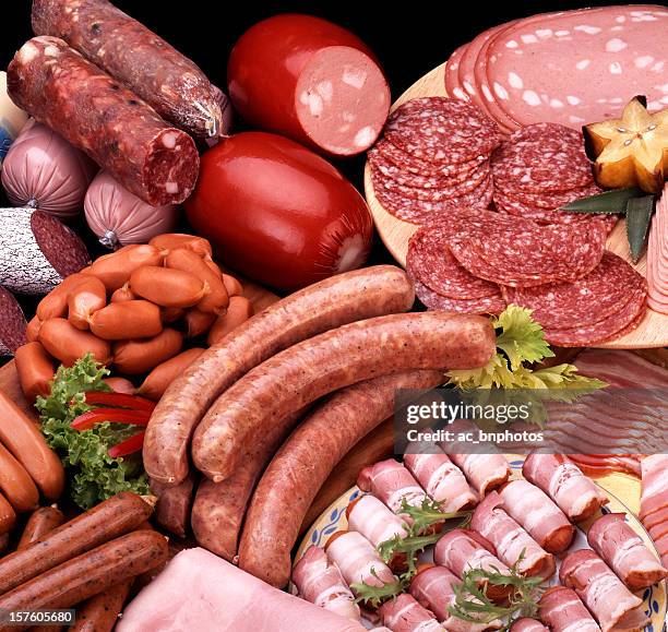 assortment of cold meats - raw sausages stock pictures, royalty-free photos & images