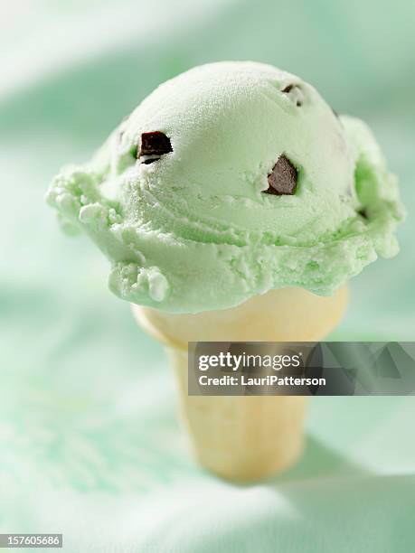 mint chocolate ice cream cone - mint ice cream stock pictures, royalty-free photos & images