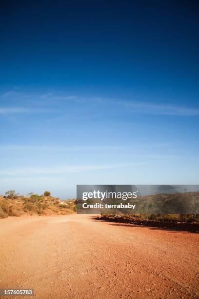 dirt track leading into the australian outback - australia desert stock pictures, royalty-free photos & images