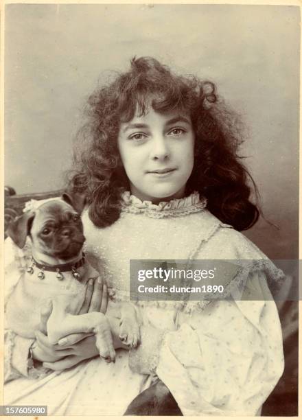 victorian mädchen und ihr hund - girls photos stock-fotos und bilder