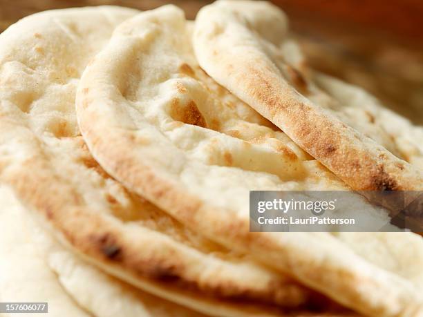 east indian naan bread - pita bread stock pictures, royalty-free photos & images