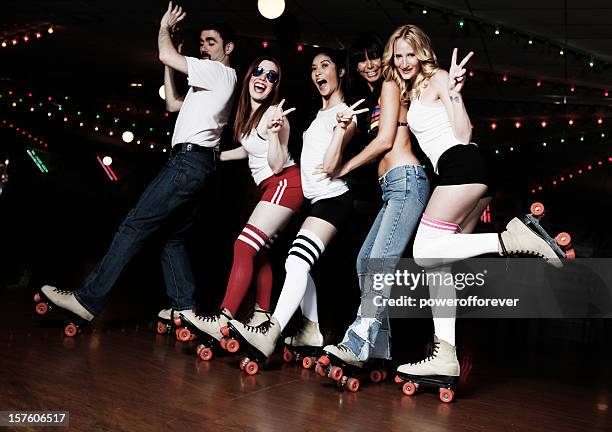 retro 70's roller disco conga line - conga line dancing stock pictures, royalty-free photos & images