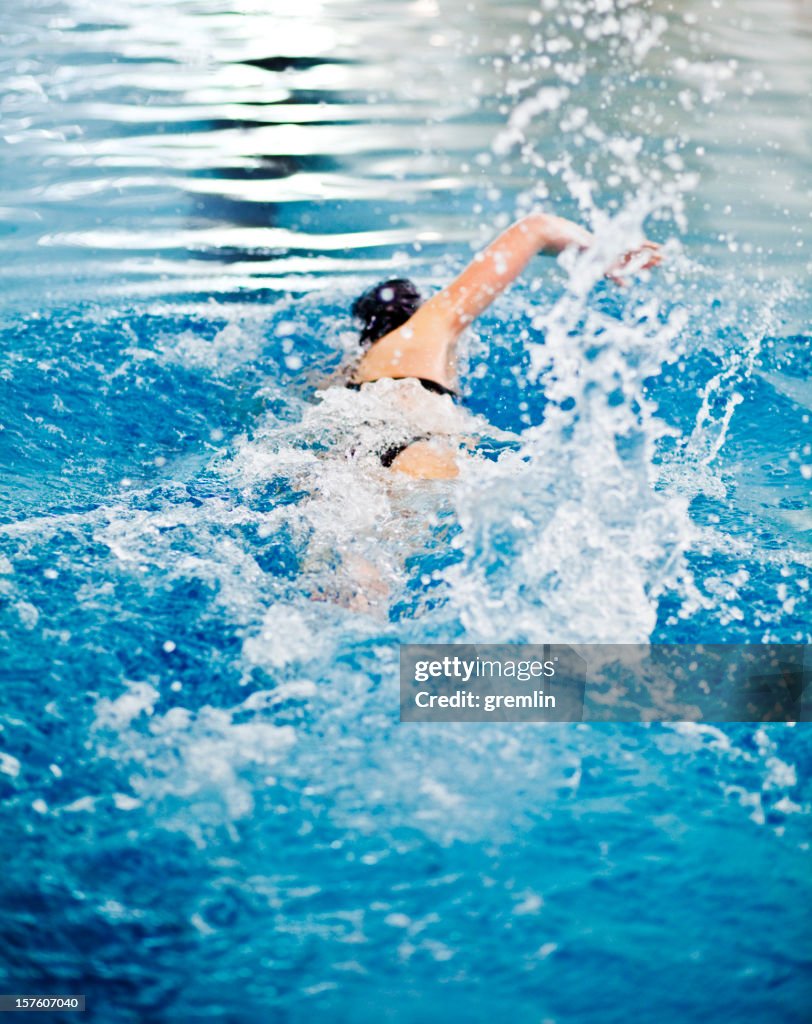 Young athlete swimming