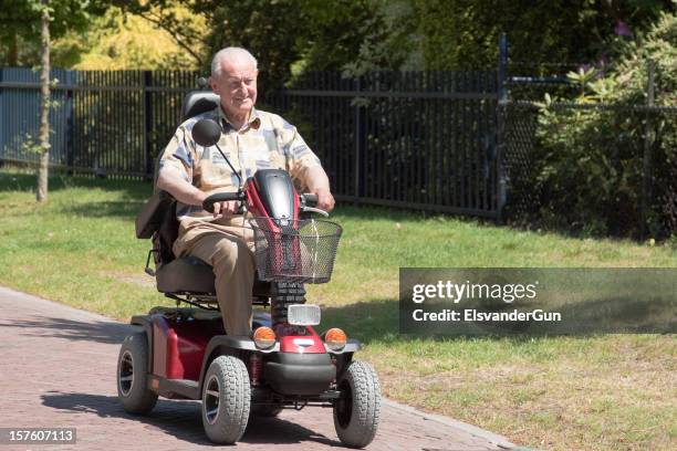 mobility scooter - motor cart stock pictures, royalty-free photos & images