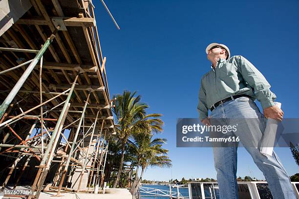 man at work looking at a construction site - sunshine coast australia 個照片及圖片檔