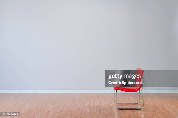 retro red chair in empty room - panela bildbanksfoton och bilder