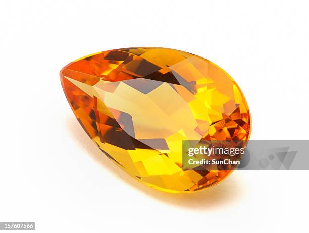 close-up photo of imperial topaz or citrine - gemstone stock pictures, royalty-free photos & images