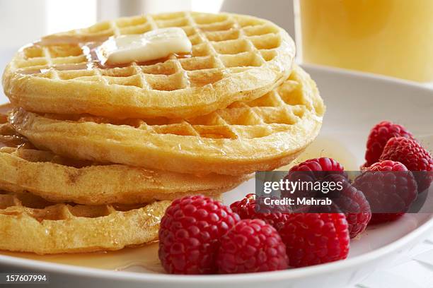 waffles and berries - raspberry syrup stock pictures, royalty-free photos & images